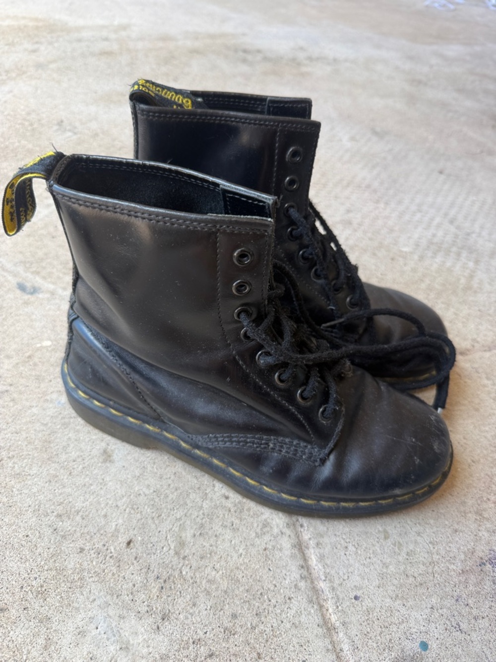 Dr. Martens Black Leather Lace-Up Boots with Yellow Accents
